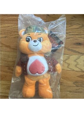 Care Bears Orange Plush with Pink Heart Patch and Brown Jacket